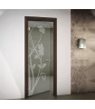 Internal hinged door with transparent glass and sandblasted designs