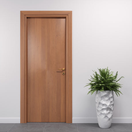 Porta interna in laminato effetto noce da abbinare al parquet della cucina